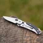 Kép 4/4 - True Utility Skeletonknife, TU571K, 4 cm rozsdamentes acél penge, eloxált alumínium tok, karabiner rögzítési pont, jobb és balkezes